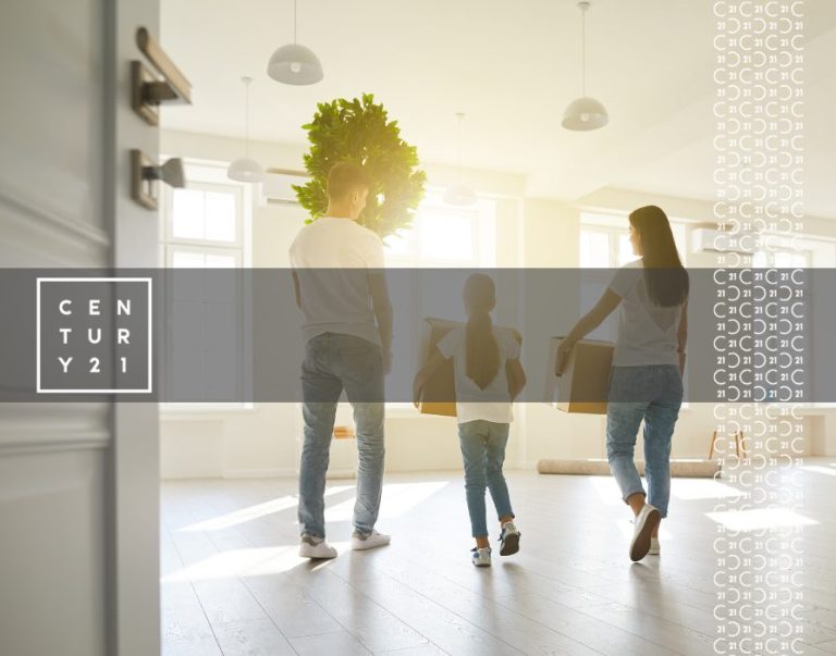Happy-Family-with-Children-Moving-with-Boxes-in-a-New-Apartment-House.-Back-View-1-768x603